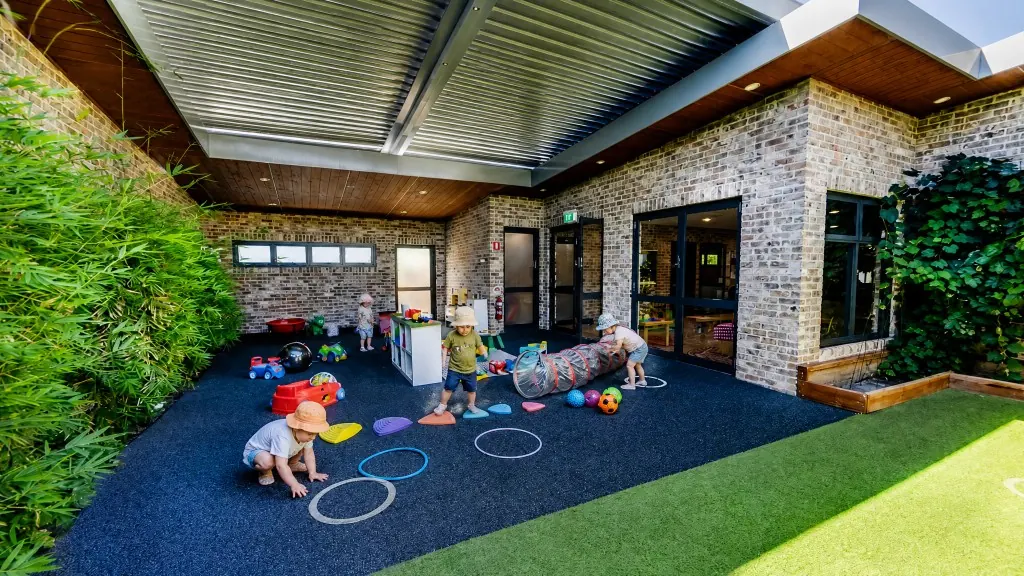 The same play area on the website after Tickaboo, with children playing under the shade
