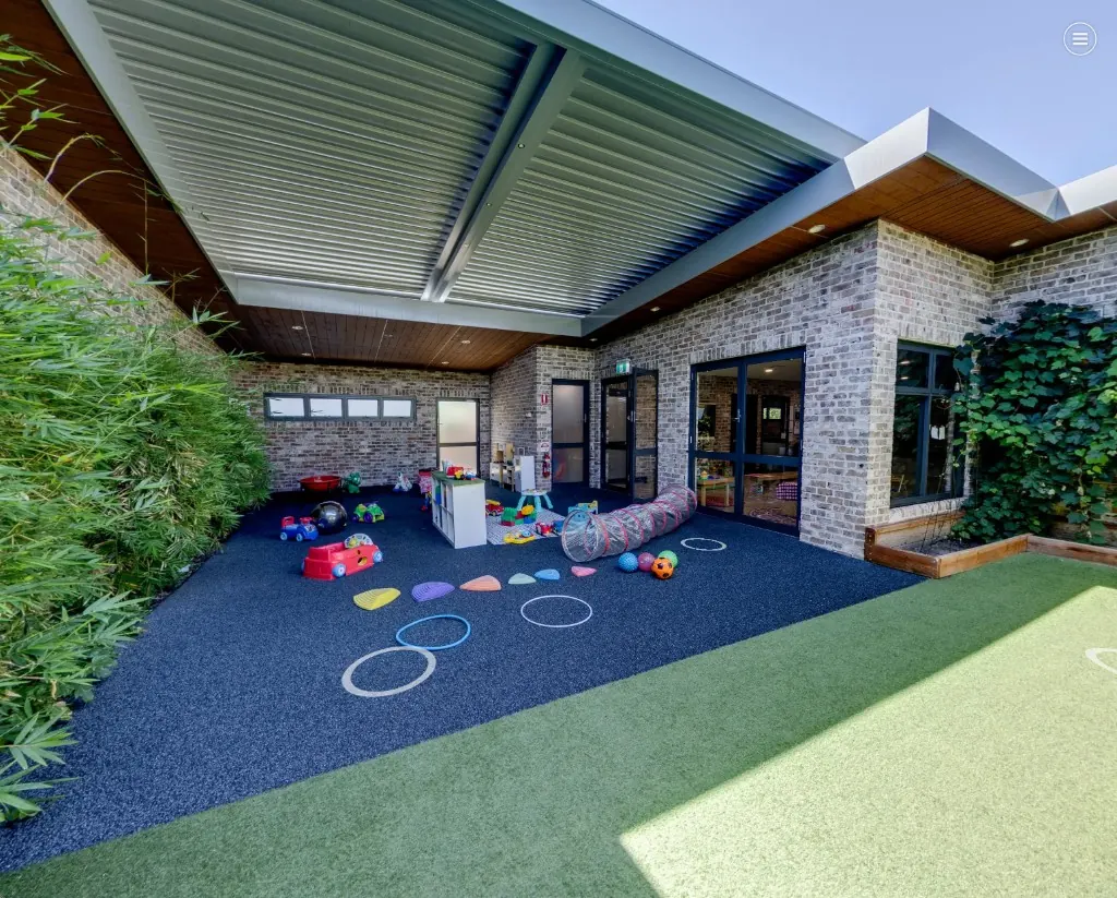An empty outdoor play area as it currently appears on a centre website